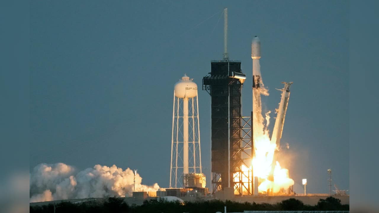 The Falcon rocket blasted off at sunset with 40 mini satellites bound for polar orbit. They will expand OneWeb’s constellation to just over 500, nearly 80 percent of the planned total of about 630 satellites. (Image: AP)