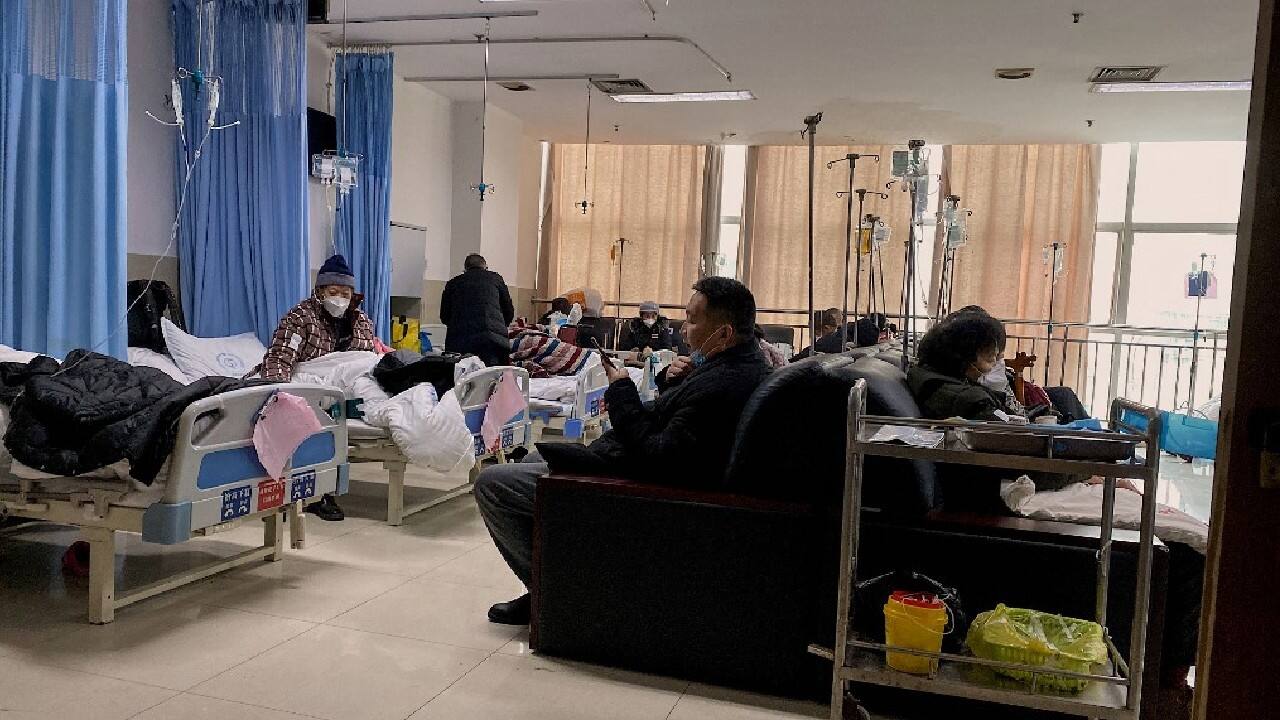 An elderly man was wheeled in on a stretcher, coughing and struggling to breathe. At the emergency department, around 50 people queued for triage, including Covid patients, with one person at the front of the queue telling AFP they had waited for more than an hour. (Image: AFP)