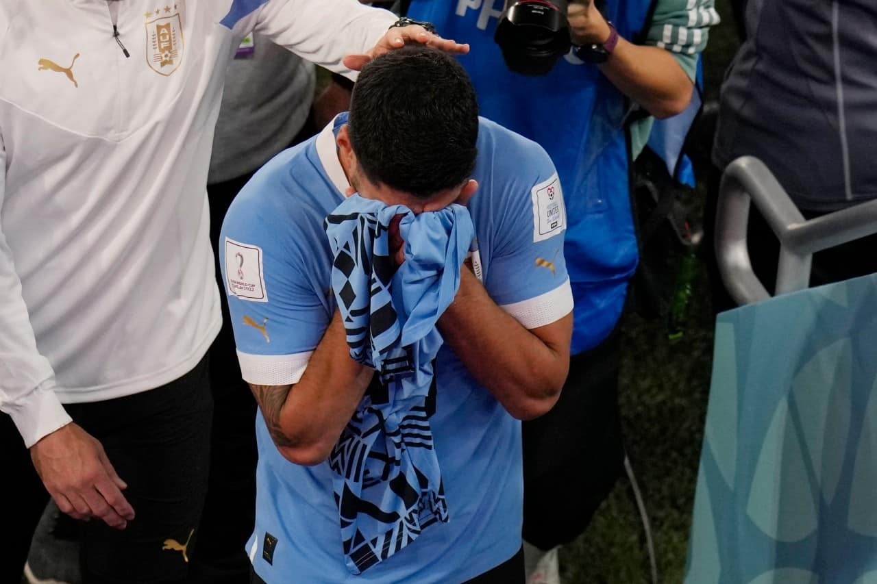 Uruguay's Luis Suarez cries at the end of the World Cup group H soccer match between Ghana and Uruguay, at the Al Janoub Stadium in Al Wakrah, Qatar, Friday, Dec. 2, 2022. (AP Photo/Aijaz Rahi)