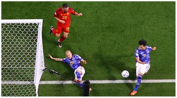 Japan's midfielder #17 Ao Tanaka scores his team's second goal during the Qatar 2022 World Cup Group E football match between Japan and Spain.