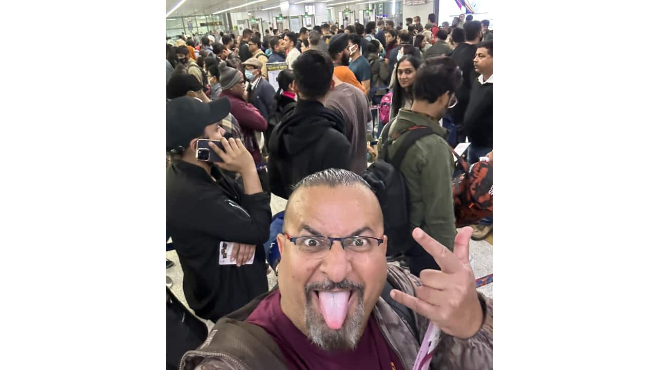 TV anchor and author Rocky Singh tweeted a photo showing a crowded security check at the T3 terminal at 5.30 am today. &quot;Welcome to HELL,&quot; he said. &quot;35 minutes to get into the airport - 25 minutes at a comparatively empty Vistara and now … the mother of all security lines… SECURITY !!! Abandon hope all ye who enter here.&quot; (Image credit: @rockyandmayur/Twitter)
