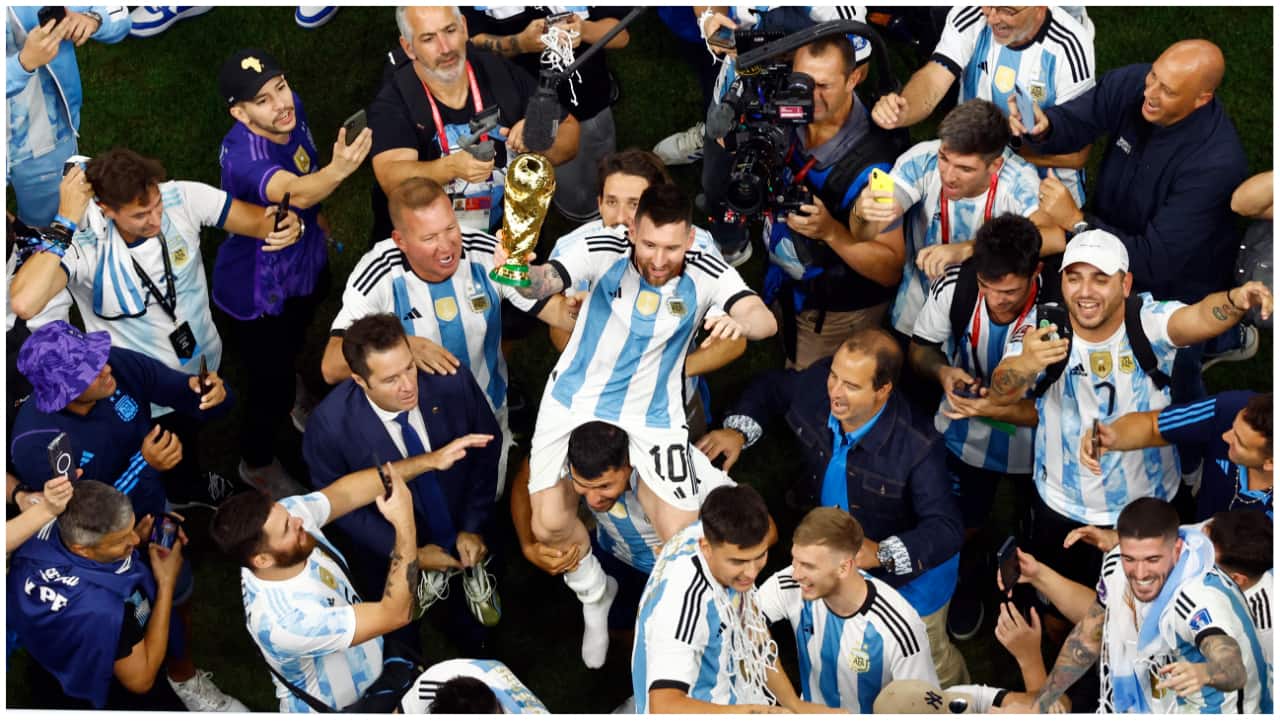 In photos Messi  Co lift World Cup trophy after thrilling final against  France