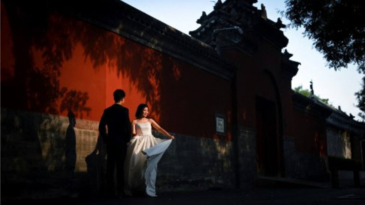 Chinese woman pays $26,000 debt for fiance she met a month ago, returns $43,000 'bride price'