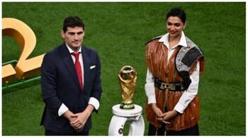 FIFA World Cup 2022: Deepika Padukone and former Spanish footballer and World Cup winner Iker Casillas stand next to the World Cup Trophy before the start of the Qatar 2022 World Cup final football match