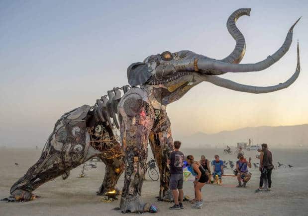 'The Monumental Mammoth', a life-sized Colombian mammoth skeleton collaged with metal found objects to tell the story of Tule Spring National Monument, at the Burning Man art festival in 2019.