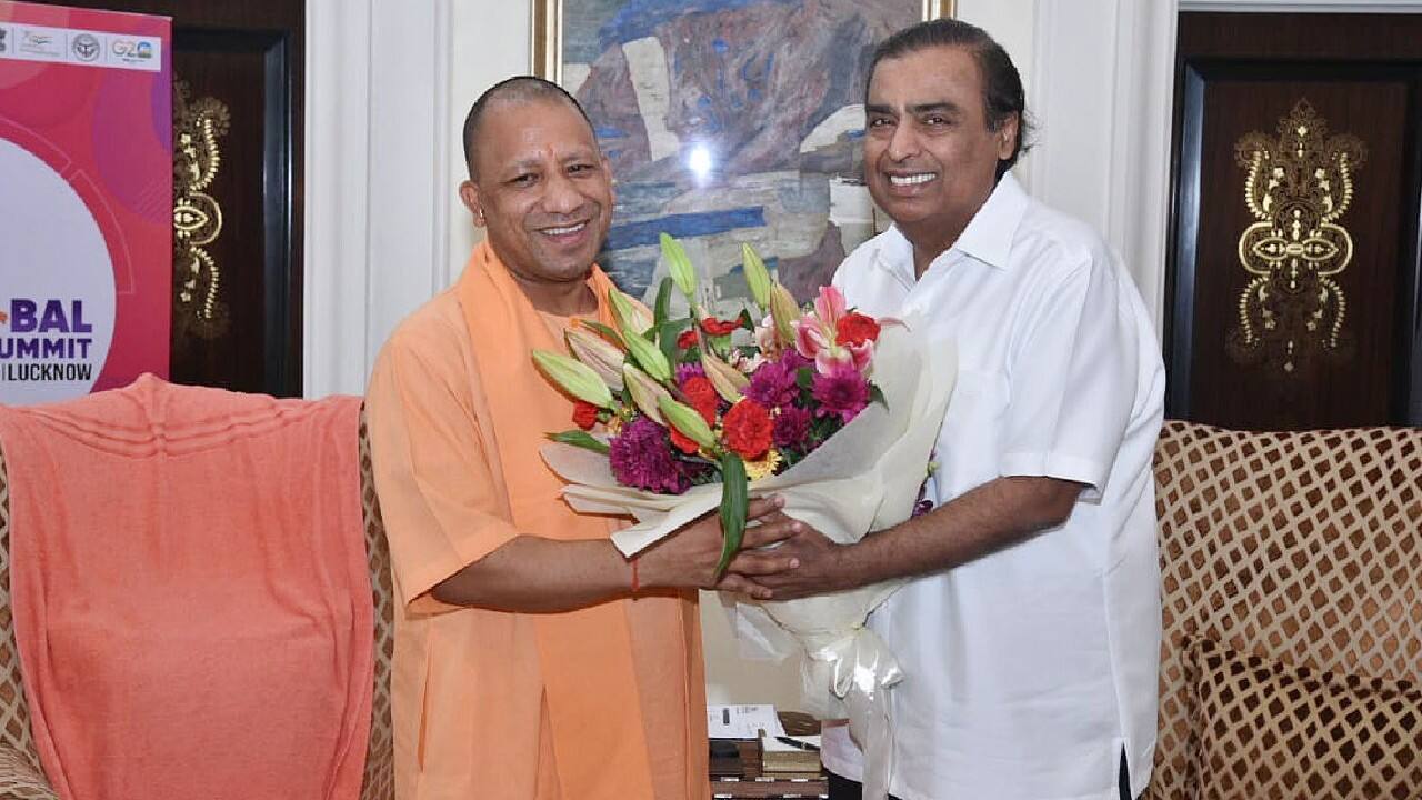 Uttar Pradesh Chief Minister Yogi Adityanath on January 5 met Reliance Industries Chairman and Managing Director Mukesh Ambani at Hotel Taj in Mumbai. UP CM, who was on a visit to Mumbai to invite Indian industry players for the upcoming Uttar Pradesh Global Investors Summit, returned to UP with investment proposals worth more than Rs 5 lakh crore, an official statement from the Government said on January 5. (Image: Twitter @myogioffice)