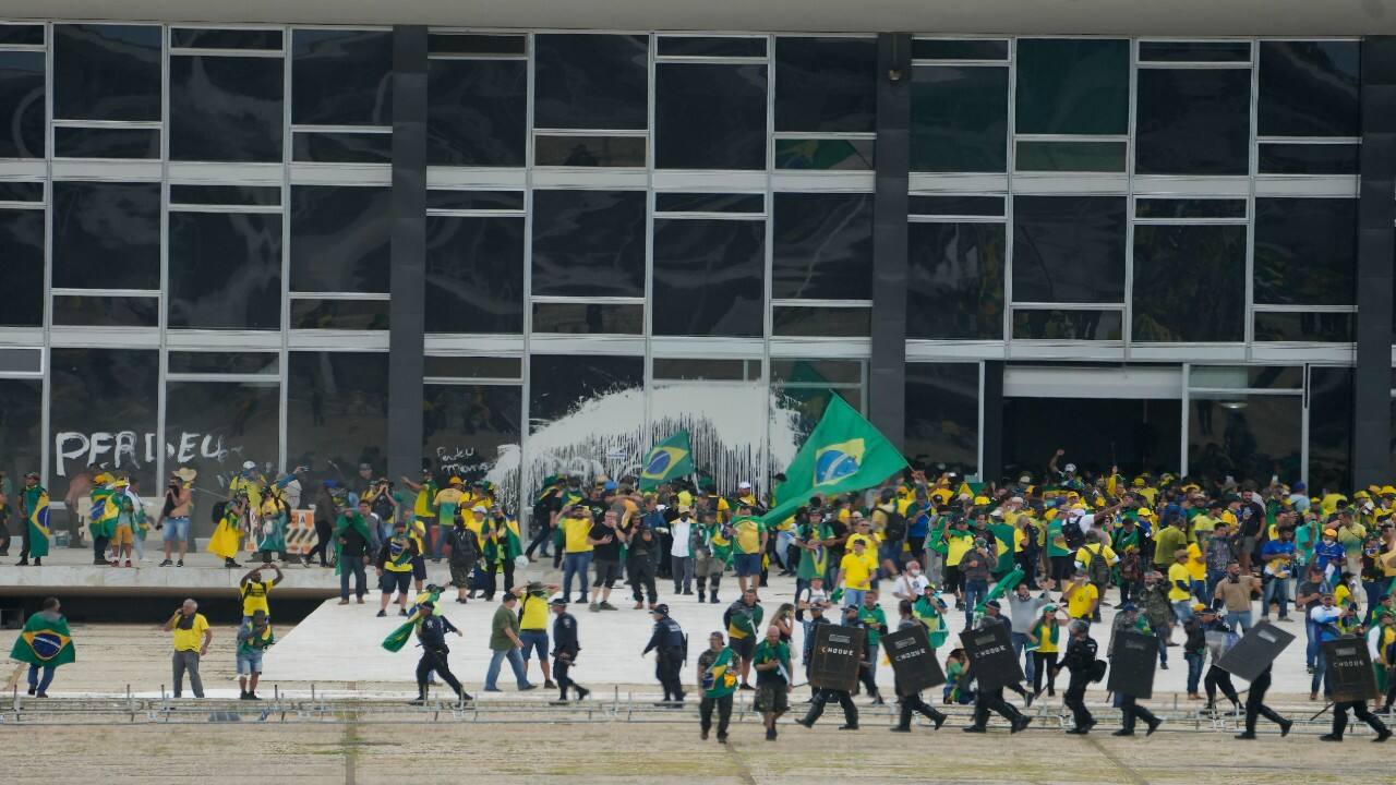 The sight of thousands of yellow-and-green clad protesters running riot in the capital capped months of tension following the October 30 presidential vote. (Image: AP)