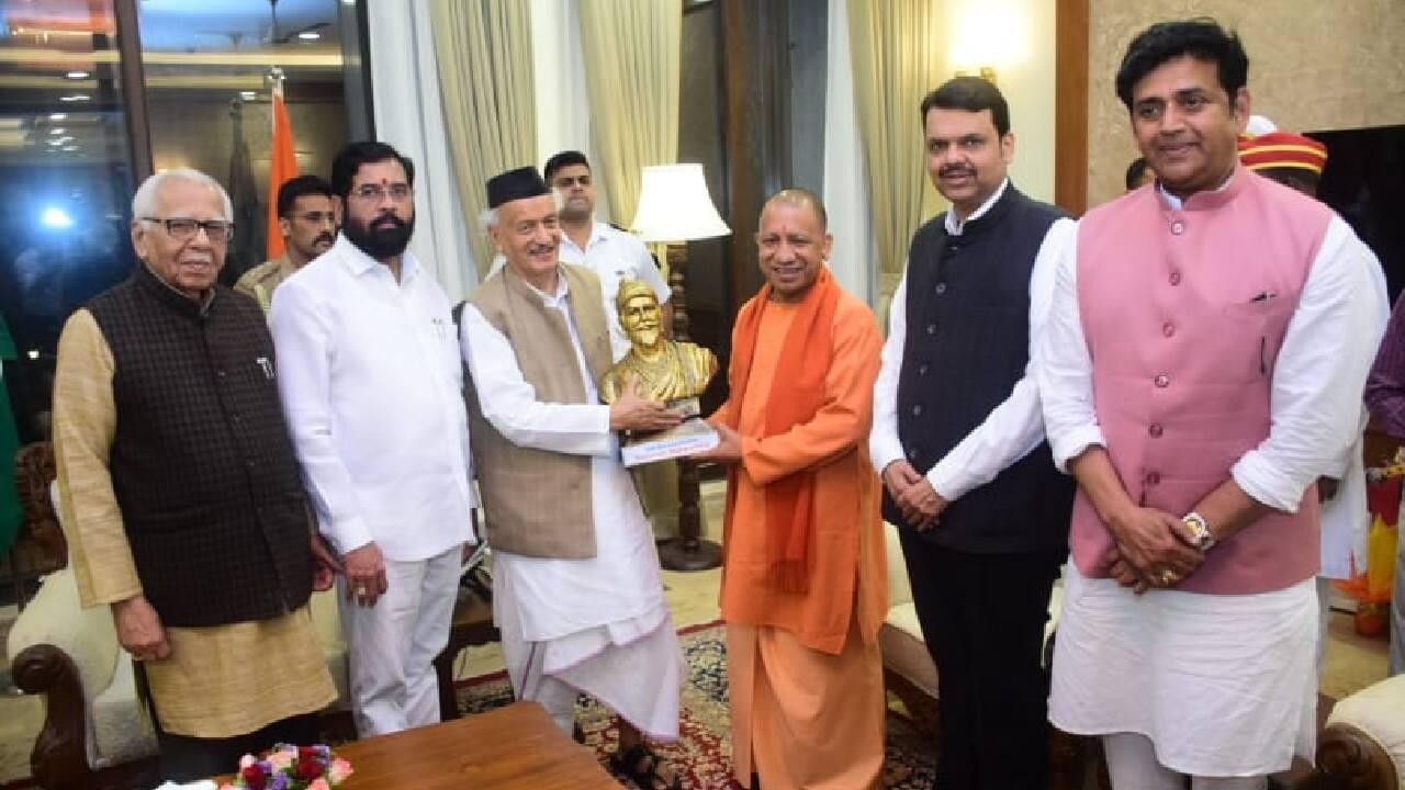 The Governor presented the bust of Chhatrapati Shivaji Maharaj to Yogi Adityanath on the occasion. (Image: Twitter @myogioffice) (With inputs from agencies) (Disclaimer: Moneycontrol is a part of the Network18 group. Network18 is controlled by Independent Media Trust, of which Reliance Industries is the sole beneficiary.)