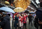 Holiday trips within China surge after lifting of COVID curbs