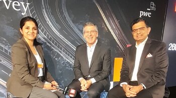 Bob Moritz and Sanjeev Krishan with Chandra R Srikanth.