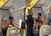 Watch: Shirtless man punches co-passenger in mid-air brawl