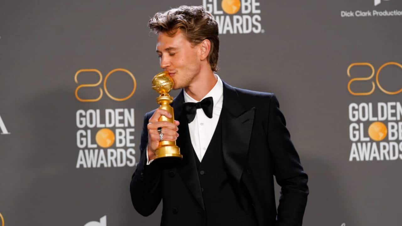 Austin Butler poses in the press room with the award for best performance by an actor in a motion picture, drama for &quot;Elvis&quot; at the 80th annual Golden Globe Awards at the Beverly Hilton Hotel on Wednesday.