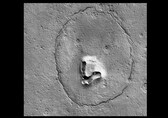 NASA captures a stunning formation resembling the face of a bear on Mars