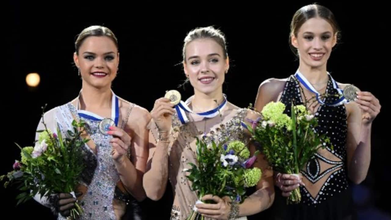 (L to R) Second placed Belgium's Loena Hendrickx, winner Georgia's Anastasiia Gubanova and third placed Switzerland's Kimmy Repond pose on the podium during the victory ceremony after the Women's Free Skating event of the ISU European Figure Skating Championships in Espoo, Finland.