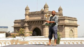 File Photo | Yousuf Pathan poses with the  ICC Cricket World Cup Trophy (Photo by Ritam Banerjee/Getty Images)