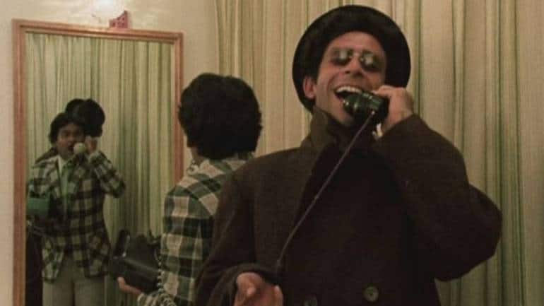 Satish Kaushik (left) and Naseeruddin Shah in a still from 'Jaane Bhi Do Yaaro'.