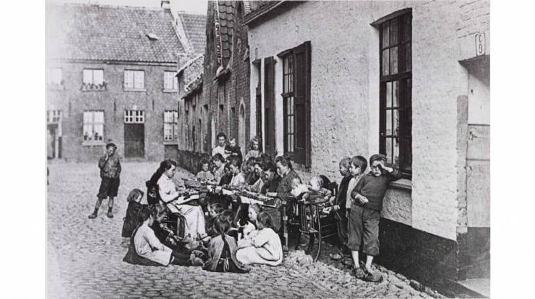 The medieval city of Brugge in Belgium is famed for its chocolates, lace and cobblestone streets. (Photo dated to around 1898, via Wikimedia Commons)