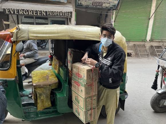 Wildlife Rescue's part-time employee Mohammad Umar bringing injured birds in cardboard boxes from various city hospitals for treatment. (Photo: Faizal Khan)