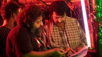 Lijo and Mammootty on the sets of 'Nanpakal Nerathu Mayakkam', which released in theatres on January 19, 2023. (Image source: Twitter/@Mammukka)