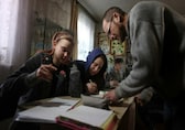 In destroyed Ukraine village, teacher turns his living room into school