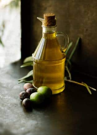 Olive oil can be used to saute or drizzle over salads. (Photo via Unsplash)