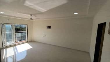 Picture of a apartment constructed by MHADA having balcony.
