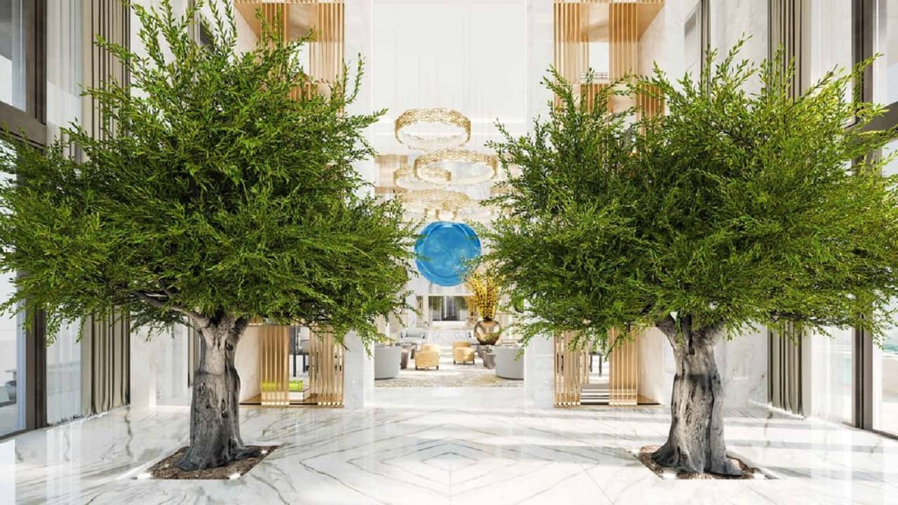 The two-level Penthouse has a private foyer with 100-year-old olive trees and ceilings that are unprecedently high. (Image: atlantis.com)