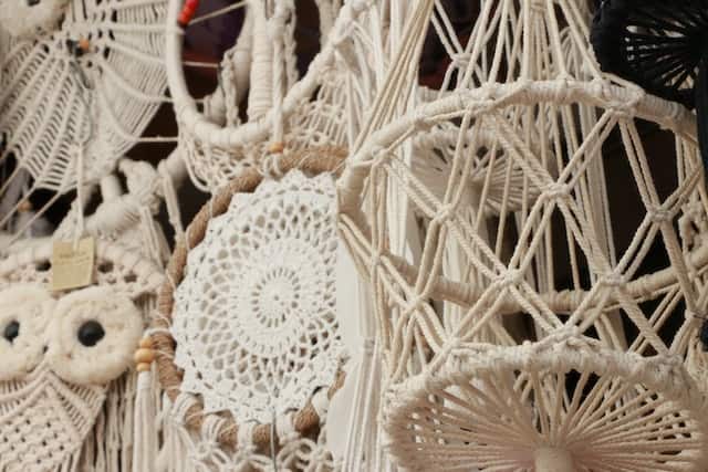 Macrame lamps and dream catchers. (Photo: Jianying Vhen via Pexels)