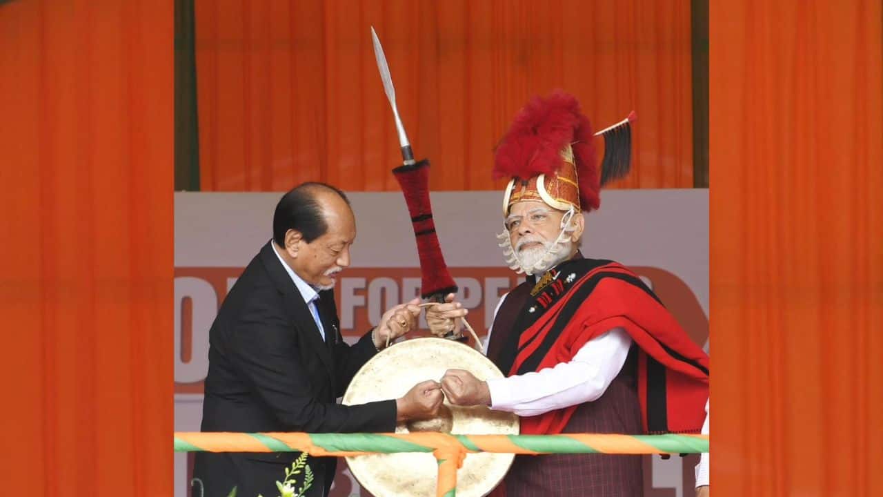 Nagaland Chief Minister Neiphiu Rio felicitates PM Narendra Modi ahead of his public address, in Dimapur on February 24. (Image: ANI)