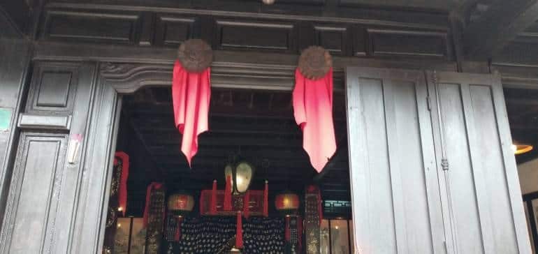 The two watchful door eyes at the entrance of each house, atop the door, ward off evil influences and balances the 'yin' and 'yang'. (Photo: Supriya Thanawala)