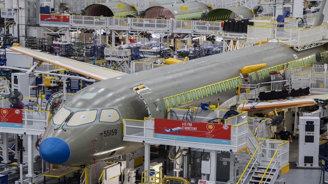 Airbus sees higher deliveries, cautions on production for A320