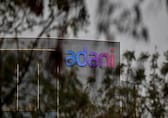 Two more Adani Group companies pledge equity in favour of SBICAP Trustee