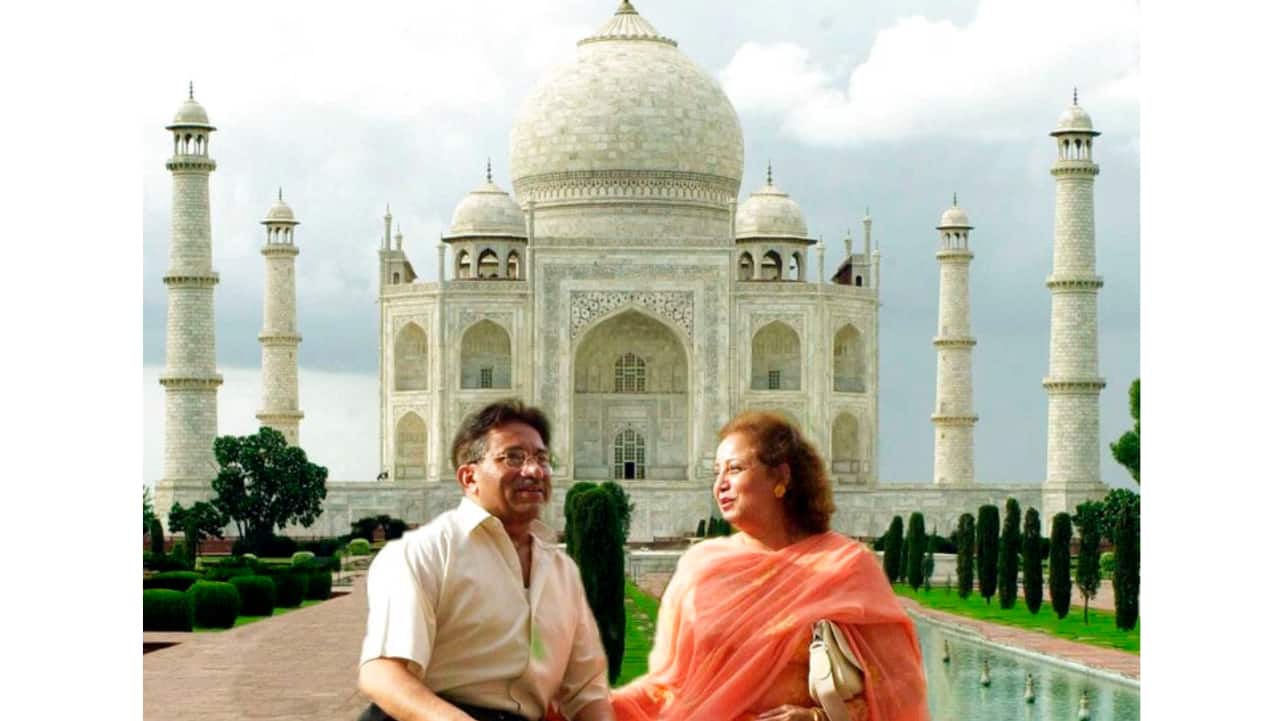 Former Pakistani President Gen. Pervez Musharraf and his wife Sehba pose in front of the Taj Mahal in Agra on July 15, 2001. 