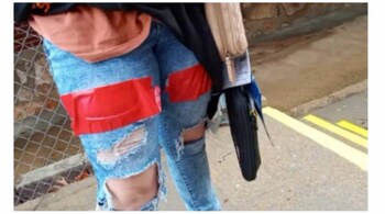 The mother shared a photo of her daughter's duct-taped legs and jeans. (Image: TikTok/shanahdrummond2)