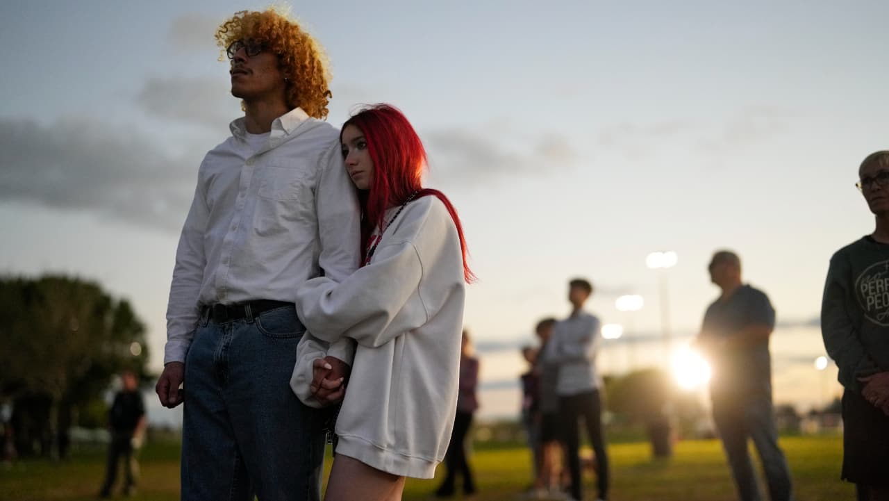 People listen to interfaith prayers during a community commemoration ceremony for the 17 students and staff of Marjory Stoneman Douglas High School who were killed at the Parkland, Fla., school, on the five-year anniversary of the shooting.