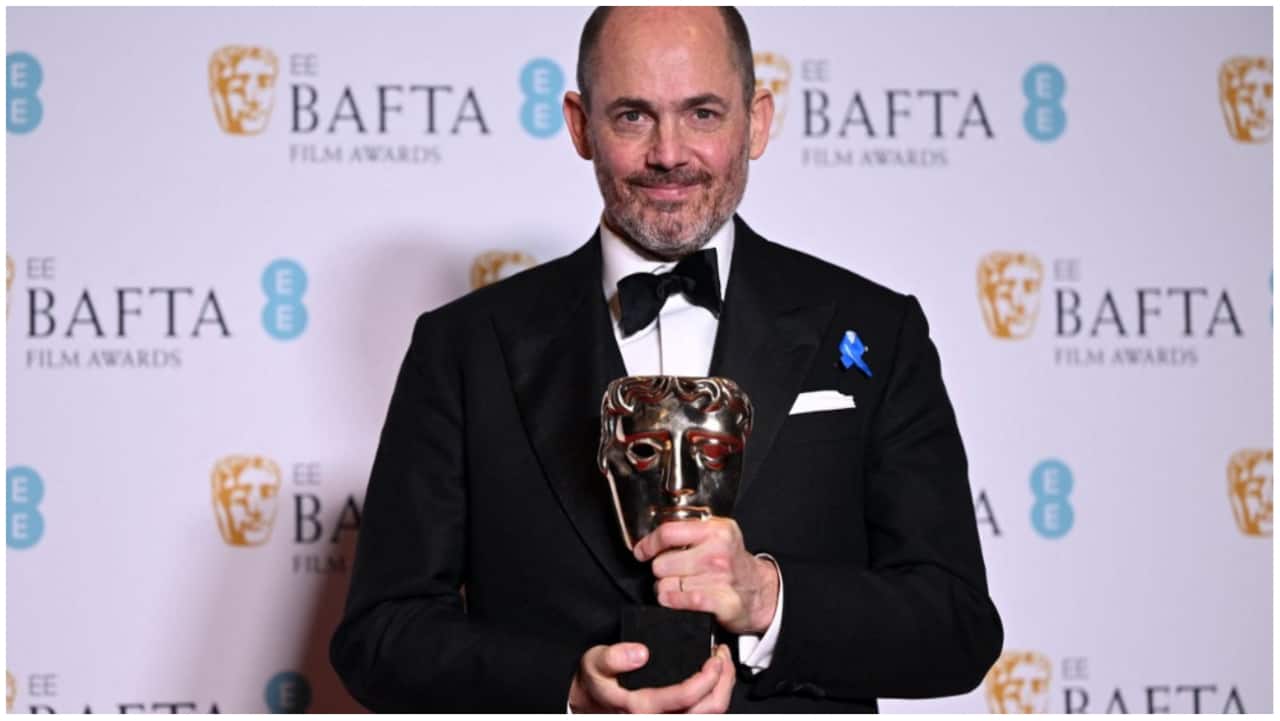 Edward Berger, the director of ‘All Quiet on the Western Front’, poses with his Best Director award at the BAFTA ceremony in Southbank Centre, London on February 20.