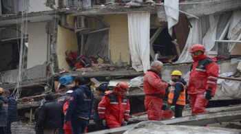 Rescue workers and volunteers conduct search and rescue operations in the rubble of a collasped building, in Diyarbakir on February 6, 2023, after a 7.8-magnitude earthquake struck the country's south-east. The combined death toll has risen to over 1,900 for Turkey and Syria after the region's strongest quake in nearly a century. Turkey's emergency services said at least 1,121 people died in the earthquake, with another 783 confirmed fatalities in Syria. (AFP)