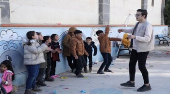 A group of Syrian volunteers of the Bonyan organisation present an entertainment show for Syrian and Turkish children in a school in the city of Gaziantep, where they have been displaced, to get them out of the psychological effects of the earthquake in Gaziantep, on February 17, 2023, after the 7.8-magnitude earthquake which struck parts of Turkey and Syria.
Zein Al RIFAI / AFP