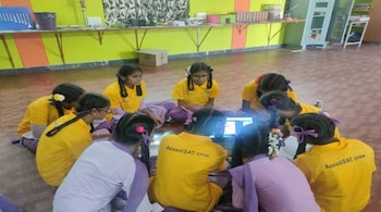 Girl students from government schools working on the AzaadiSat 2.0
