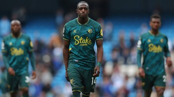 Hassane Kamara of Watford FC looks dejected following their side's defeat in the Premier League match between Manchester City and Watford at Etihad Stadium on April 23, 2022 in Manchester, England. (Photo by Alex Livesey/Getty Images)