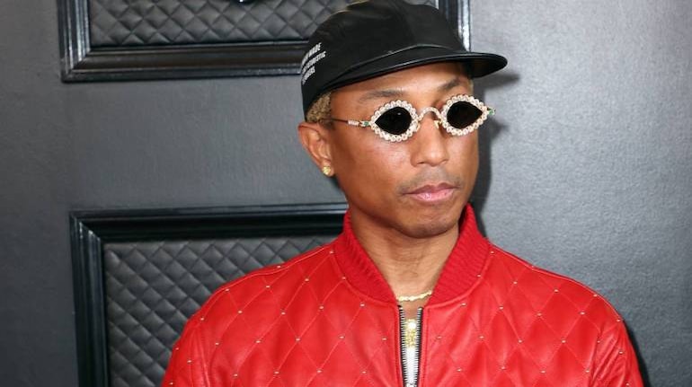Pharrell Williams at Louis Vuitton is a different look from Gucci