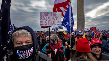 Pro-Trump protesters in front of the US Capitol Building on January 6, 2021 in Washington, DC. A pro-Trump mob had later stormed the Capitol, breaking windows and clashing with police officers. Five people died as a result. (Photo by Brent Stirton/Getty Images)