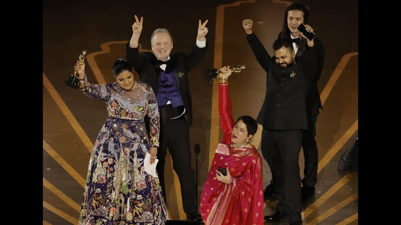 'The Elephant Whisperers' team celebrate their big win. 