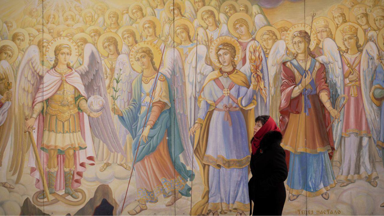 Outside the landmark Saint Michael’s Golden-Domed Monastery in central Kyiv, people pose for photos beside destroyed Russian tanks and armored vehicles. Nearby, yet more photos are being added to a wall with pictures of those killed in the fight against Russia. (Source: AP) Outside the landmark Saint Michael’s Golden-Domed Monastery in central Kyiv, people pose for photos beside destroyed Russian tanks and armored vehicles. Nearby, yet more photos are being added to a wall with pictures of those killed in the fight against Russia. (Source: AP)