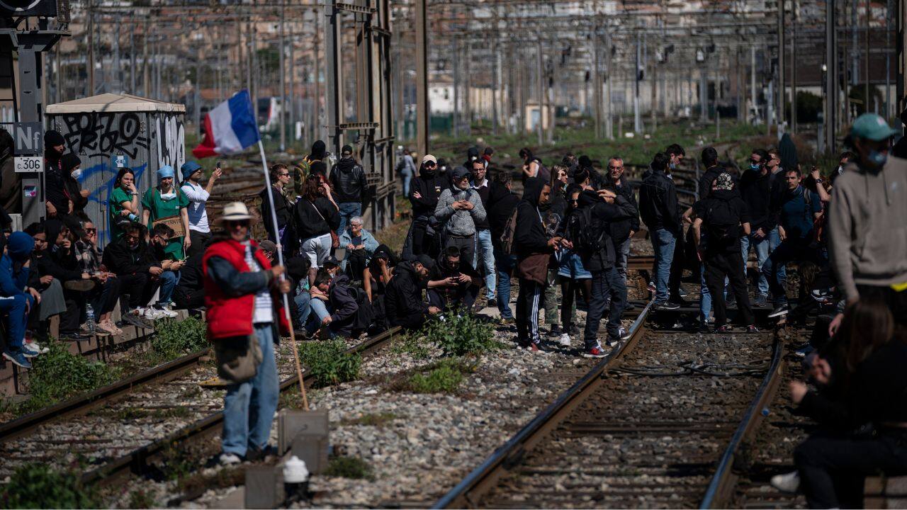 Some protesters, human rights campaigners and Macron's political opponents allege that police officers have used excessive force against demonstrators. A police oversight body is investigating multiple claims of wrongdoing by officers. The striking railway workers outside Gare de Lyon marched behind a banner that alleged: "The police mutilates. We don't forgive!” (Source: AP)