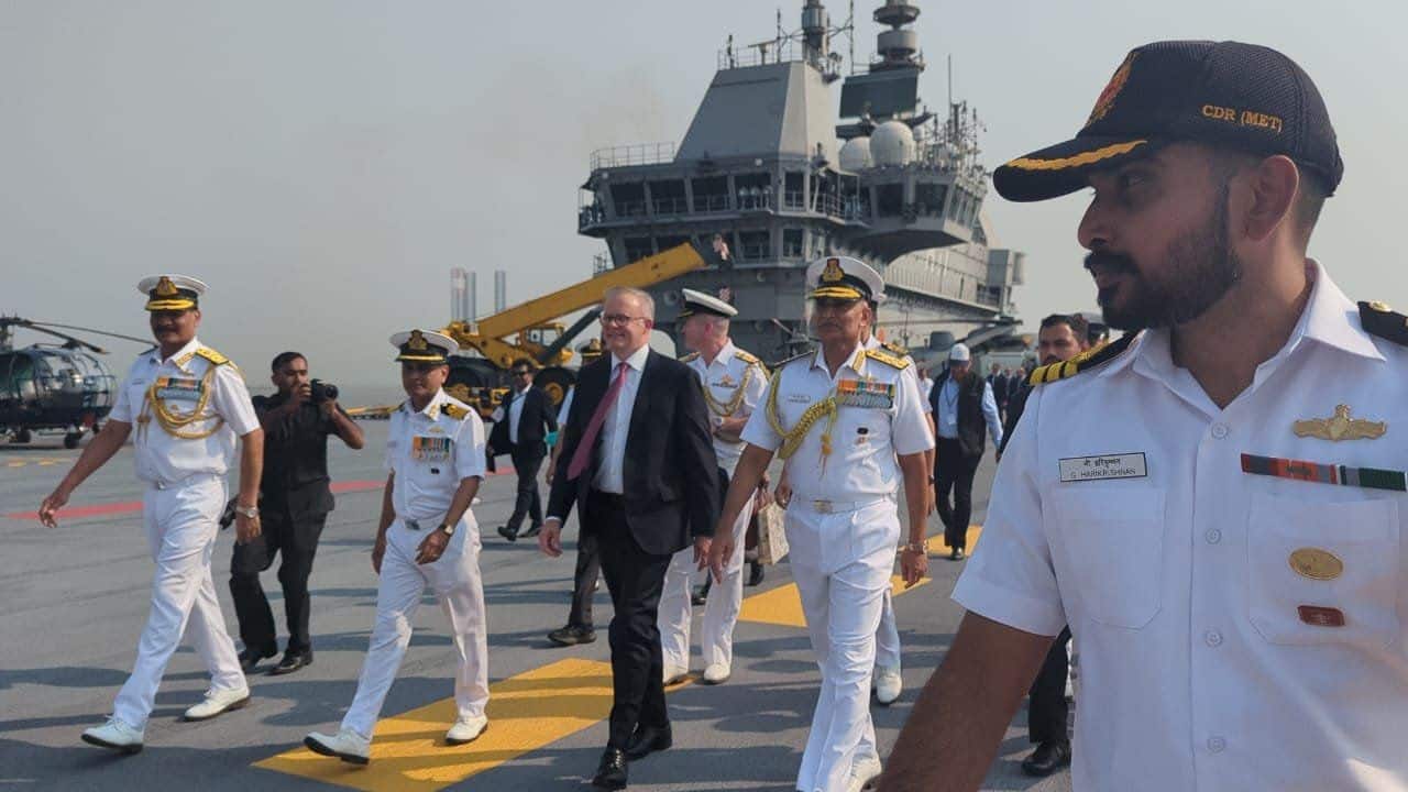 Australian Prime minister Albanese on March 9 embarked on India's indigenous aircraft carrier INS Vikrant, in Mumbai. Albanese was received onboard Vikrant by Chief of Naval Staff Admiral R Hari Kumar with a Guard of Honour. (Image: ANI)