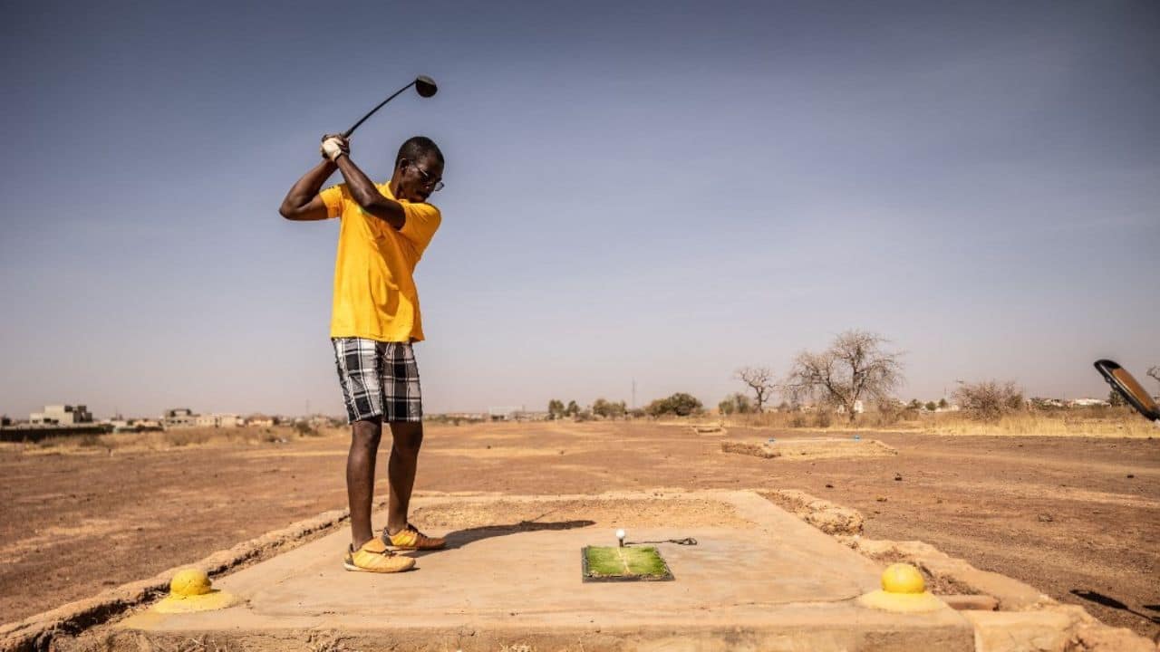 The golf club's origins date back more than half a century, to the time when the area "was a village, with people growing crops and raising cattle," said the director of sports, Abdou Tapsoba. It was his father, he says, who introduced golf to Ouagadougou after taking up the sport while in the French army following World War II. (Source: AFP)