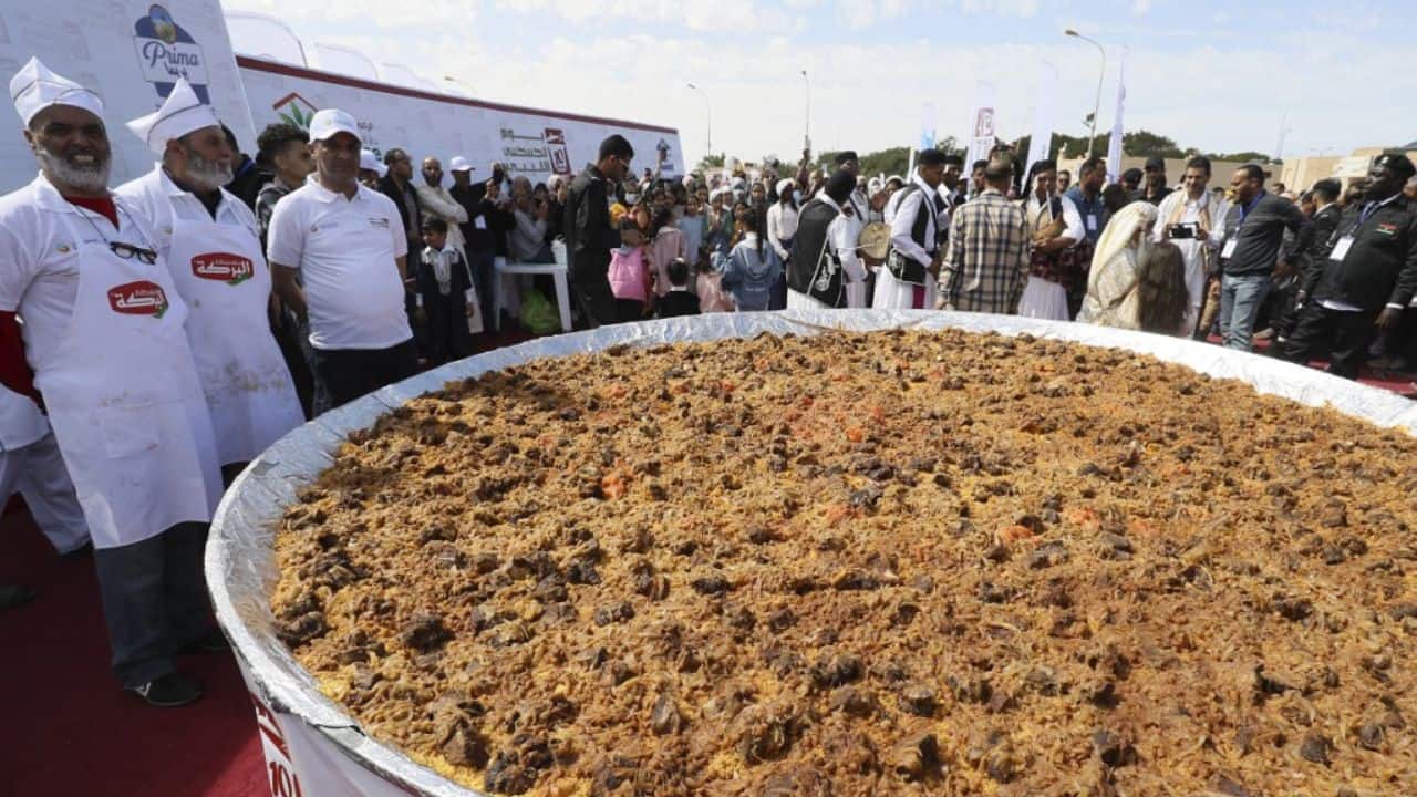 Fakhri was delighted to see Libyans come together for a day in a country that endured more than a decade of chaos following the 2011 overthrow and death of longtime dictator Moamer Kadhafi. "I come from a village known for its couscous, which you can smell from far away," said Fakhri, a well-travelled doctor from Tripoli. "The whole of the Maghreb is renowned for its couscous, which distinguishes us from the Arab east". (Source: AFP) Fakhri was delighted to see Libyans come together for a day in a country that endured more than a decade of chaos following the 2011 overthrow and death of longtime dictator Moamer Kadhafi. "I come from a village known for its couscous, which you can smell from far away," said Fakhri, a well-travelled doctor from Tripoli. "The whole of the Maghreb is renowned for its couscous, which distinguishes us from the Arab east". (Source: AFP)