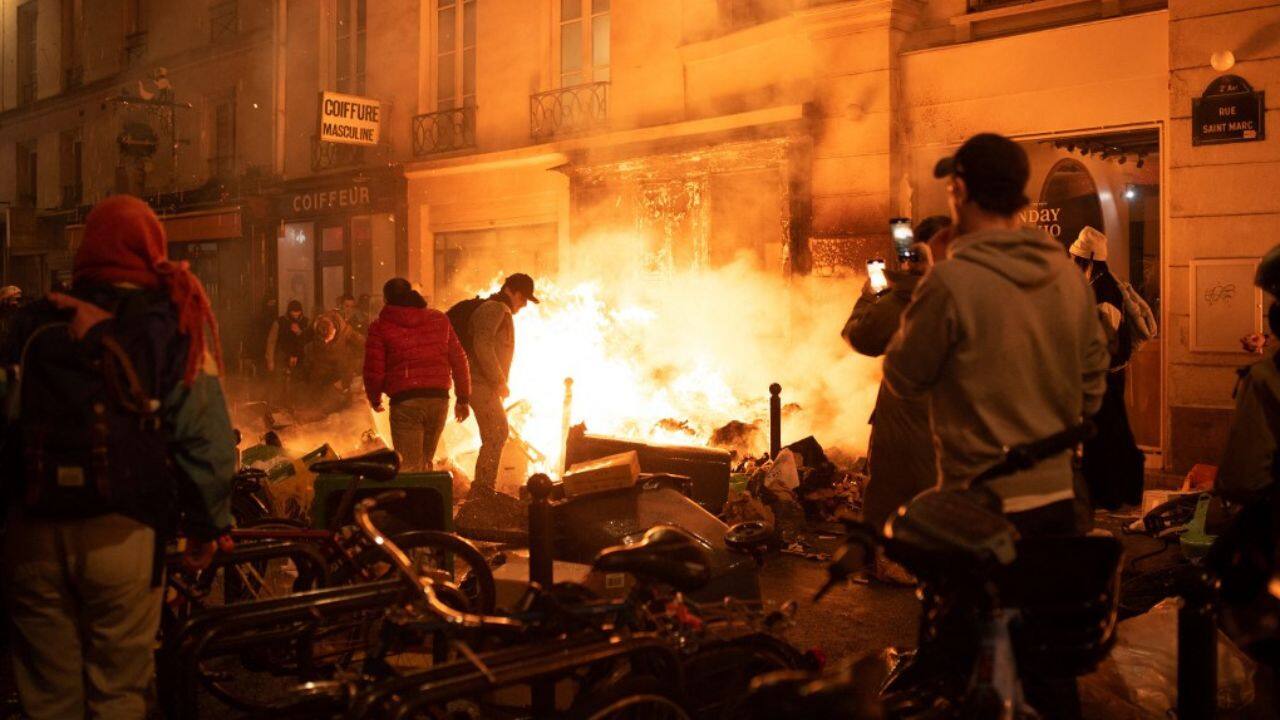 Almost 150 police were injured and scores of protesters arrested nationwide, the government said, as a day of protests descended into chaos in several cities including Paris, where protesters lit fires in the historic centre of the city. (Source: AFP)