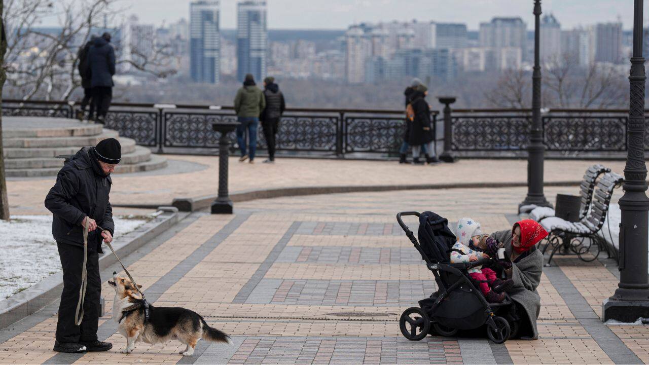 Shops, restaurants and bars are open — even if customers have to wrap up their evenings early and rush home in time for the 11 p.m. curfew. Nobody pays attention to the angular steel anti-tank hedgehogs by the side of the road, or the occasional pile of sandbags. (Source: AP) Shops, restaurants and bars are open — even if customers have to wrap up their evenings early and rush home in time for the 11 p.m. curfew. Nobody pays attention to the angular steel anti-tank hedgehogs by the side of the road, or the occasional pile of sandbags. (Source: AP)